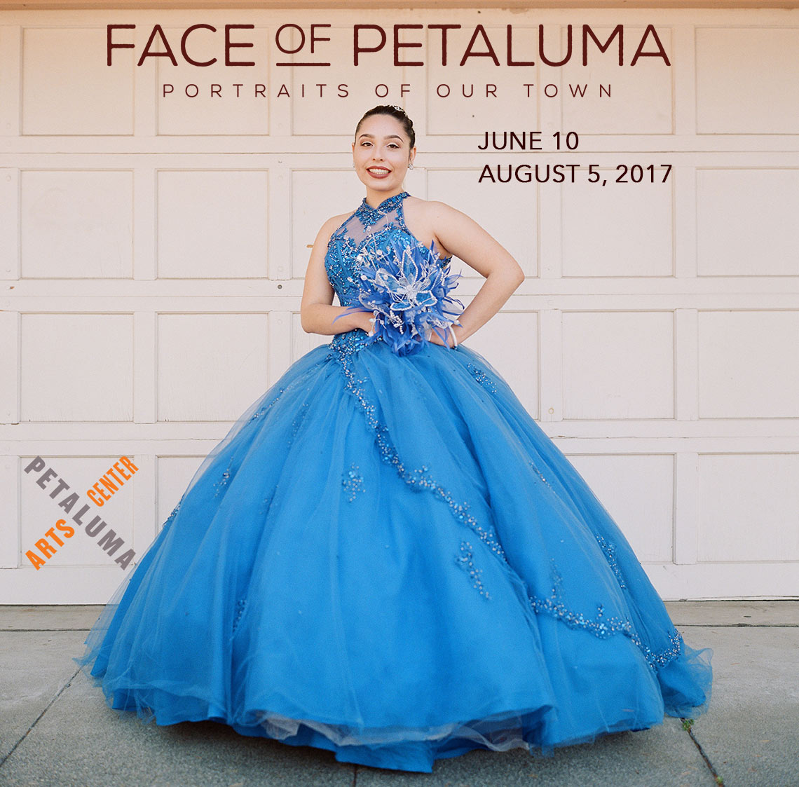 Photograph of a girl in a blue quinceañeara dress by Paige Green