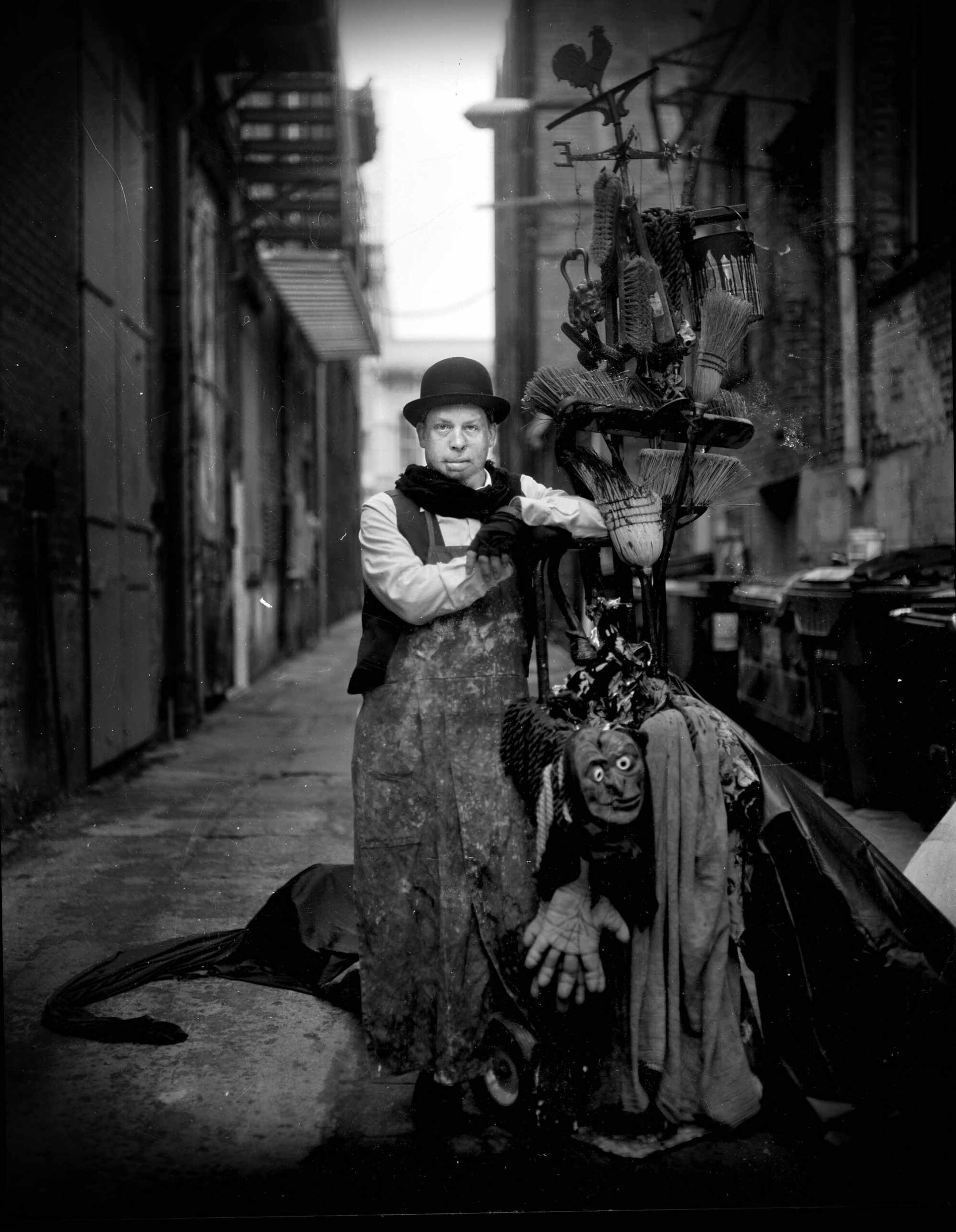 black and white photo of a man in an alleyway by Michael Garlington